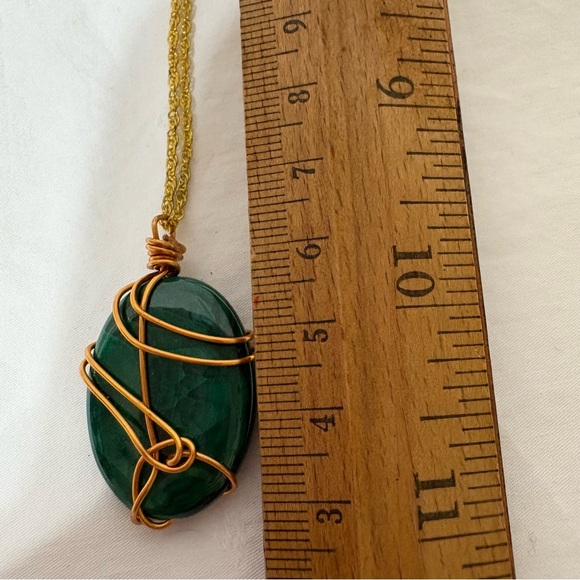 malachite wire-wrapped pendant with a gold-toned chain. - Picture 5 of 6